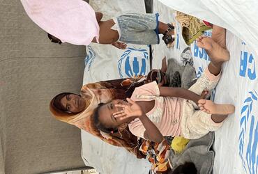 An internally displaced family in a gathering site for forcibly displaced people in Port Sudan, Red Sea State. © UNHCR / Deep Raj Uprety